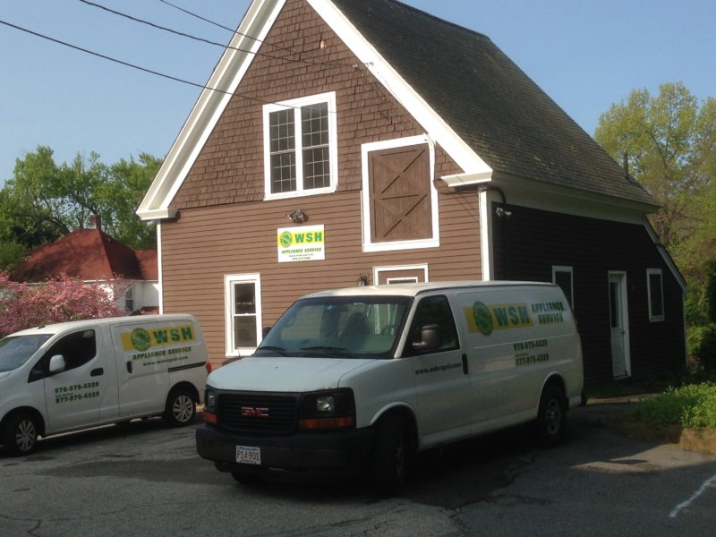 WSH Appliance Service trucks pared in front of office