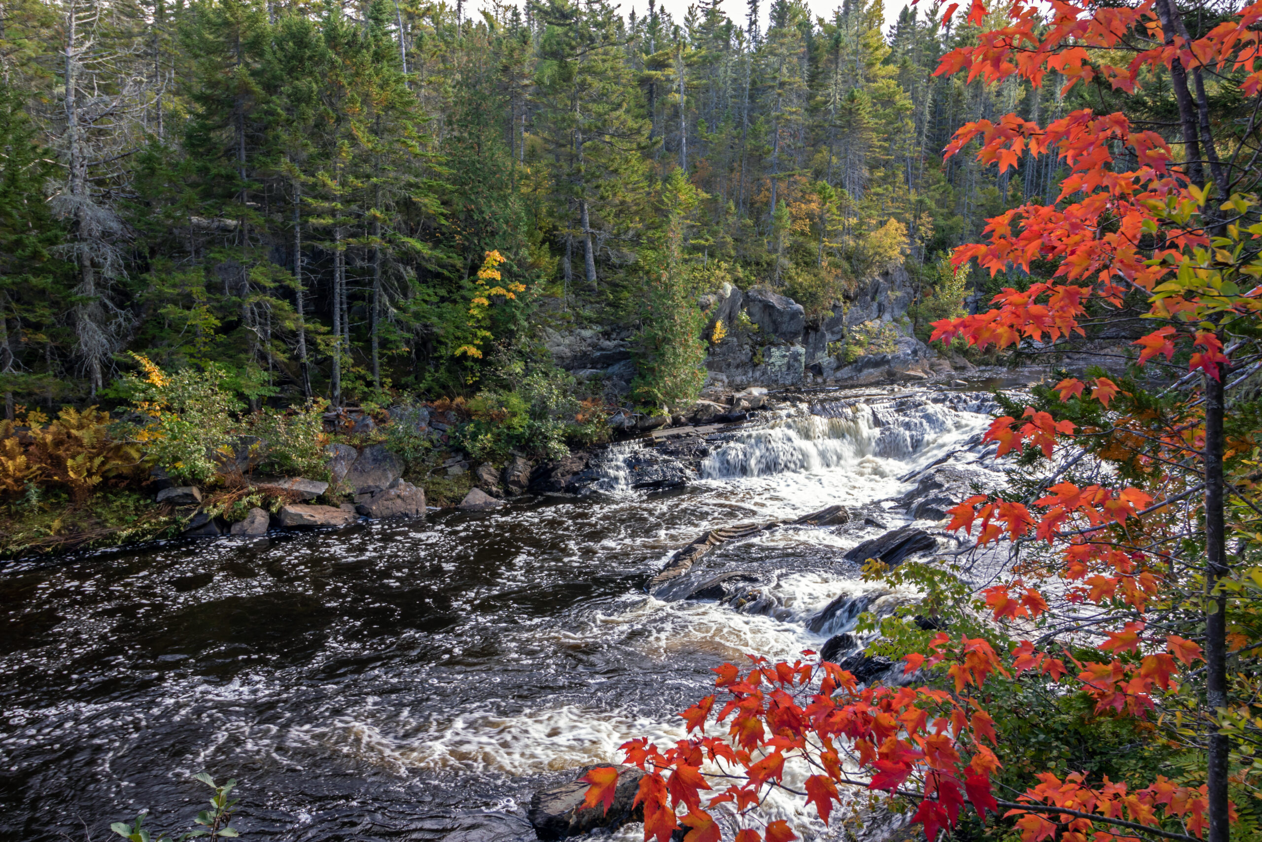 Scenic waterfall in Maine, symbolizing the peace of mind that comes with safe personal insurance coverage for life’s unexpected moments.